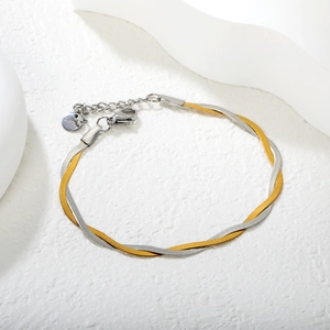 Two-tone intertwined snake chain bracelet in gold and silver stainless steel