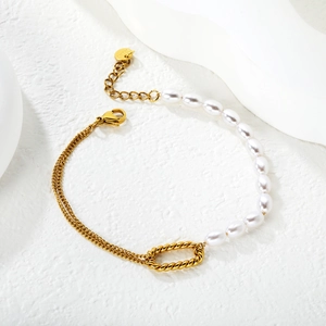 Bracelet double chaîne en acier inoxydable avec perles blanches et anneau doré