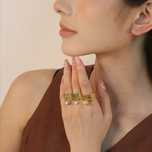 18K gold plated stackable rings set with butterfly shell charms and pearl on textured bands