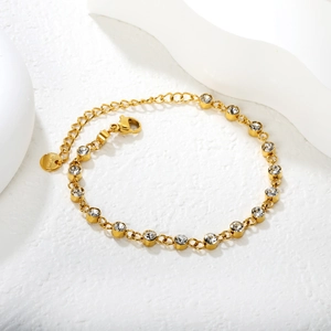 Elegant gold stainless steel link bracelet with sparkling circular crystal settings