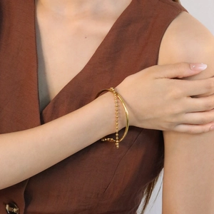 Set minimalista di bracciale rigido e catena a sfere placcato oro 18K da donna