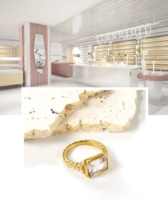 Detailed macro view of a 18K gold-plated twisted band ring with rectangular zircon stone