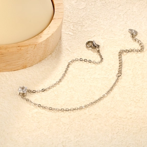 Elegant stainless steel bracelet featuring a small square zircon pendant with a polished finish