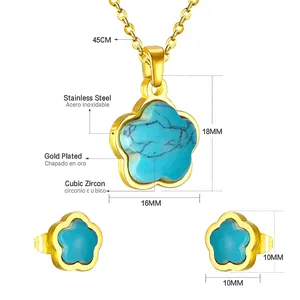 Detalle del conjunto de collar y pendientes de flor turquesa en acero inoxidable dorado