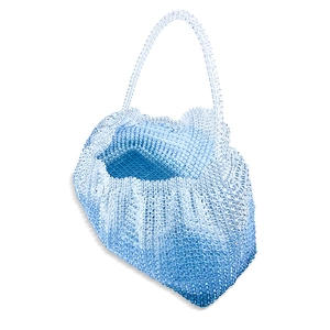 Detail of light blue beaded handbag showing transparent acrylic texture and woven pattern