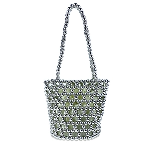 Close-up of handmade silver beaded bucket bag featuring green silk lining and mesh texture