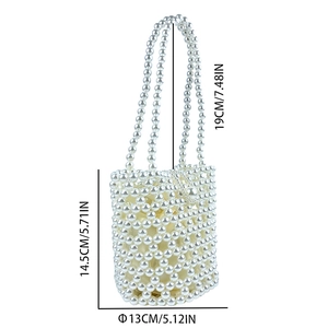 Detailed size specifications for a handmade beaded bucket bag with ivory faux pearls