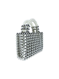 Handcrafted silver bead and pearl woven handbag with a sophisticated hollow design