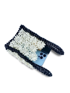 Handmade hollow daisy pearl beaded handbag with black and white retro aesthetic