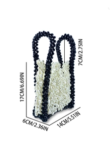 Handmade daisy pearl beaded handbag with black contrast trim and arched top handles