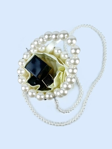 Handmade pearl beaded bucket bag with white faux pearls and a long pearl chain strap