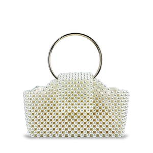 Detailed macro view of white faux pearl woven handbag with a round golden metal handle