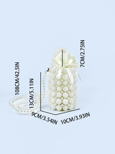 Detail view of pearl beaded bucket bag showing 13cm height and satin drawstring lining