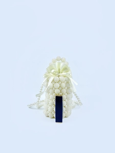 Handmade white pearl woven bucket bag with satin drawstring and long pearl chain strap