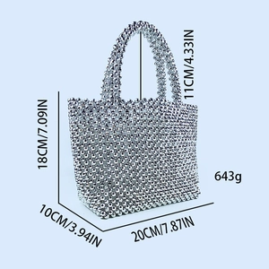 Detail showing dimensions of silver beaded handbag: 20cm x 10cm x 18cm with handle height
