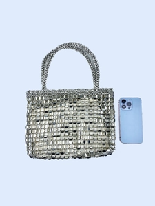Silver sequin beaded tote bag with dual ring handles and reflective metal chain texture