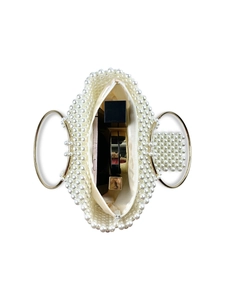 Beaded pearl evening bag with gold handle and interior storage view for essentials