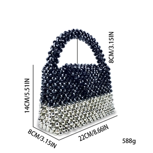 Detail view of handmade beaded handbag with 22x8x14cm size measurements and black silver beads