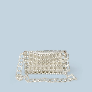 Detail of handmade hollow beaded tote bag with pearl mesh and satin lining