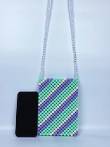Handmade beaded crossbody bag with mint green and lavender acrylic pearls on white background