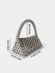 Silver beaded handmade handbag with triangular cutout flap and dimensions marking