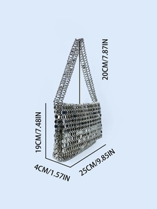 Silver sequin shoulder bag with metal disks showing 19cm height and 25cm width dimensions