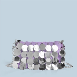 Detail of lavender sequin shoulder bag with large silver sequins and metal chain