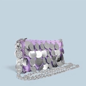 Detail of purple sequin bag with chunky silver chain strap and shiny paillettes