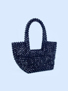 Handcrafted black beaded tote bag with double handles and polished geometric facets