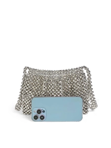 Close-up of silver beaded crossbody bag with a smartphone for size comparison