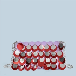 Detail of lavender sequin bag with red and silver metallic discs and silver chain strap
