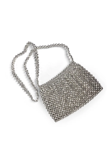 Close-up of woven metallic silver beads showing intricate texture on the crossbody bag