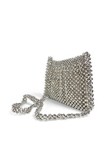 Detailed view of handmade silver metallic beaded crossbody bag with woven texture