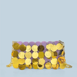 Detail of lavender evening bag featuring large gold sequins and a slim metal chain strap