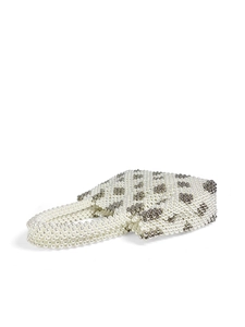 Detailed view of handmade cream faux pearl beaded tote with diamond pattern texture