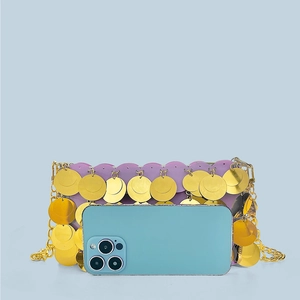Sparkly sequins evening bag size comparison with a smartphone showing golden metal sequins