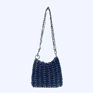 Detail of navy blue sequin chainmail crossbody bag with interlocking metallic rings