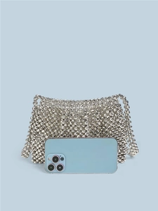 Handmade silver metallic beaded square crossbody bag with phone for size reference
