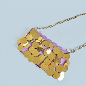 Close-up of purple mini bag with gold scale sequins and elegant metallic chain