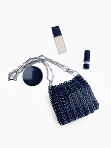 Fashionable black metallic sequin hollowed crossbody bag with elegant chain strap and blue charm