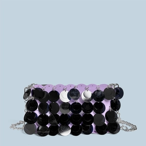 Detailed view of lavender sequin bag with silver chain strap for evening parties