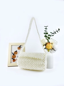 Elegant white handmade pearl woven rectangular flap crossbody bag with pearl strap