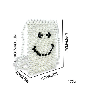 Detailed dimensions of white handmade beaded smiley bag with long pearl crossbody strap
