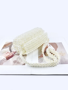 Elegant white handmade pearl beaded cylindrical bucket tote bag with matching shoulder strap