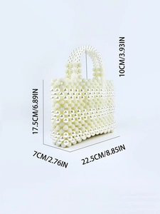 Elegant white handmade pearl beaded handbag with vintage mesh design and arched handle