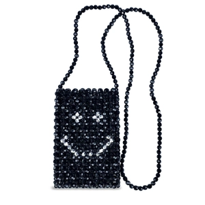 Detail shot of a handmade black beaded crossbody phone bag with a shiny silver smiley face