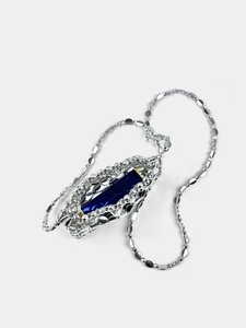Silver hollow woven mini bag pendant necklace with deep blue gemstone insert