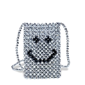 Detail of silver beaded crossbody bag with a black beaded smiley face pattern