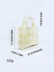Detail view of handmade pearl evening bag with 22.5x17.5x7cm dimensions and weight info