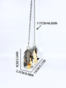 Detailed size view of a handmade mini sequin crossbody bag with metal chain strap